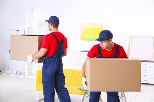 Removal team loading items for a transparent Holloway Storage quote