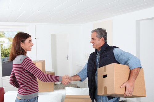 Organised boxes and furniture in a Holloway self storage unit