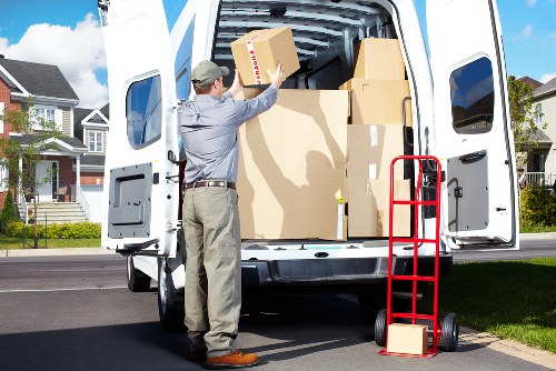 Flat removals planning in Holloway with boxes and moving van