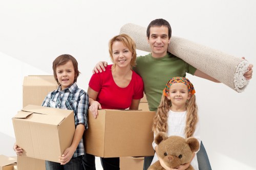 Team preparing for office removals in Holloway with labels and inventory lists