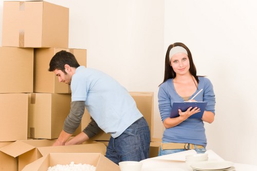 Packed technology and office supplies during an office move in Holloway