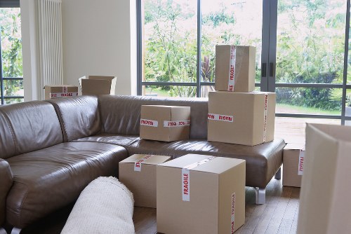Moving furniture through a narrow Holloway stairwell