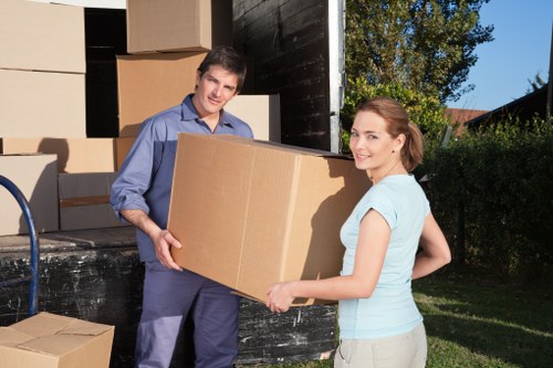Business relocation in Holloway showing packed office equipment ready for transport